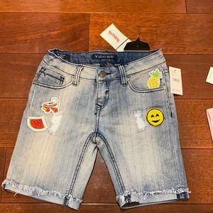 Distressed jean shorts with fun patches!